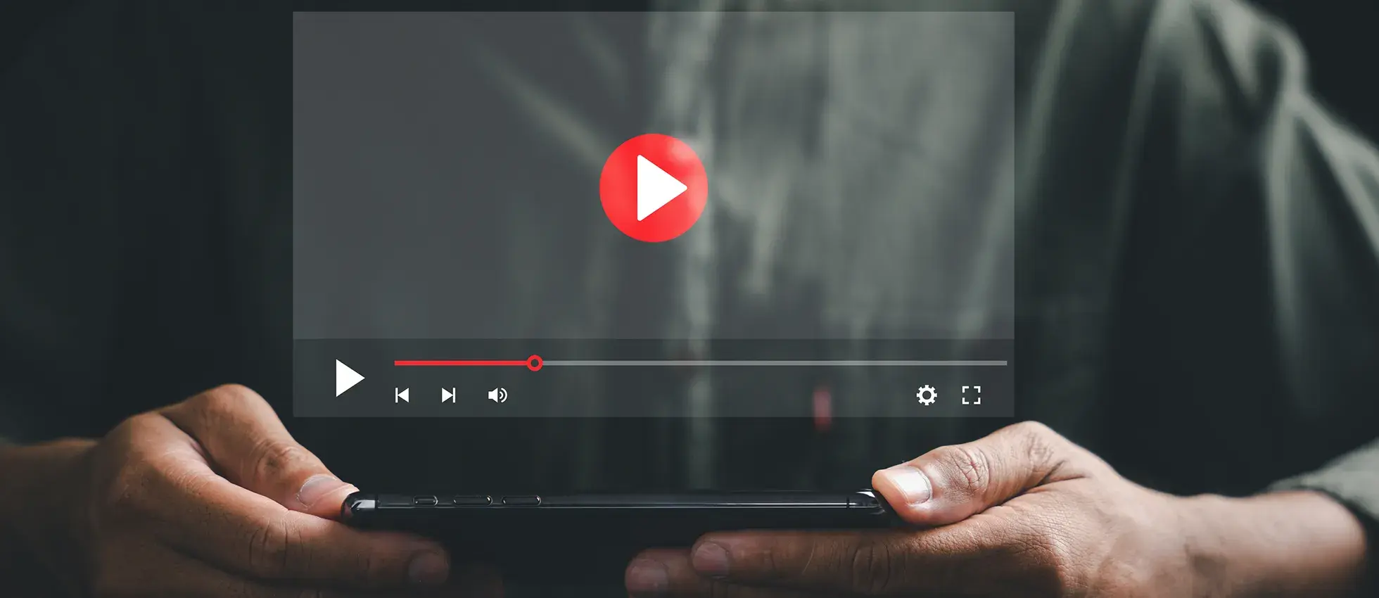 an image of a phone in a mans hands with a video overlay