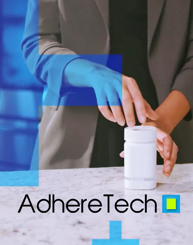 an image of a lady with a pill bottle for the Adhere Tech - Website Design & Development