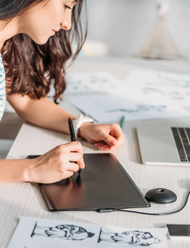 an image of a designer using a tablet